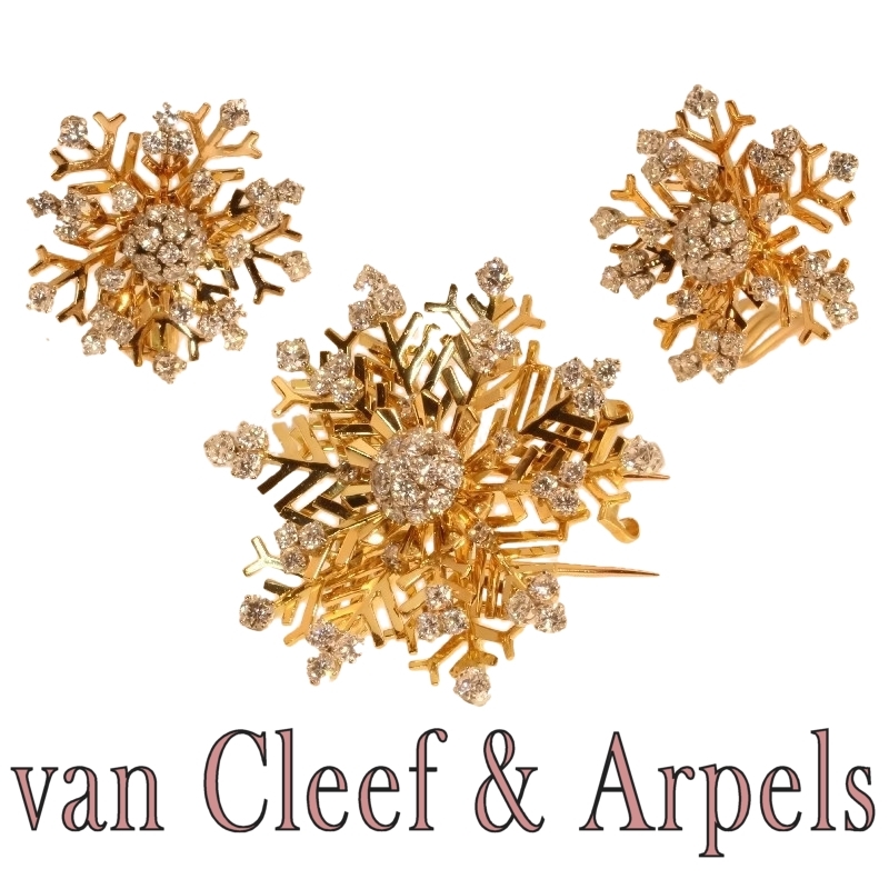 Dazzling Van Cleef & Arpels tricolour gold snowflake pendant and earrings topped with diamonds
